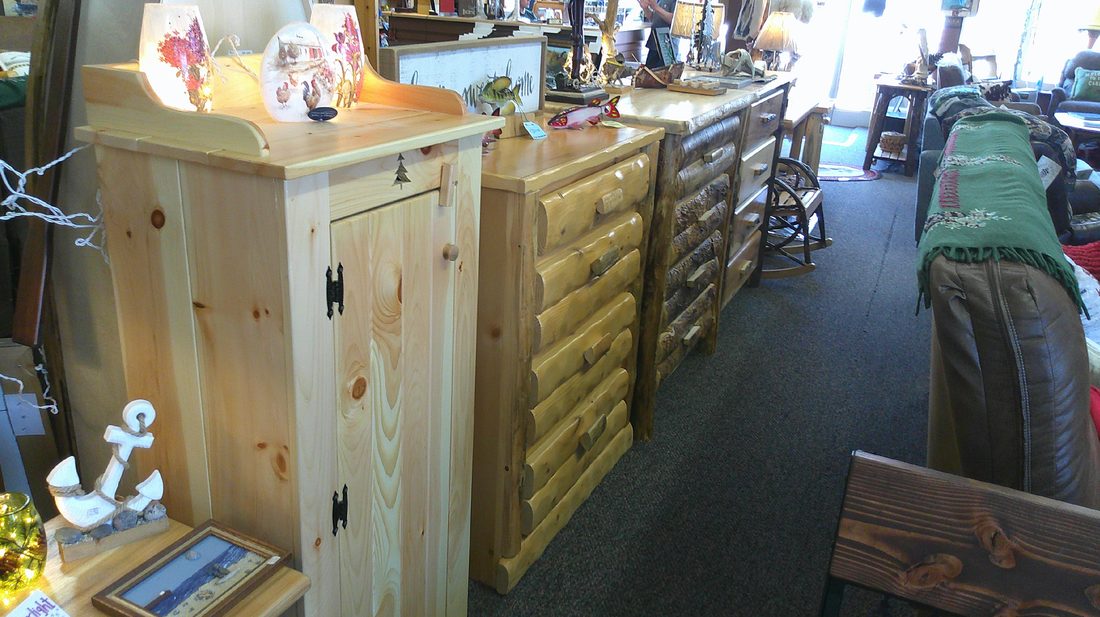 Log furniture dressers on the Exclusive Moose showroom floor